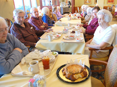 King Cake and Residents at Autumn Leaves Retiremen